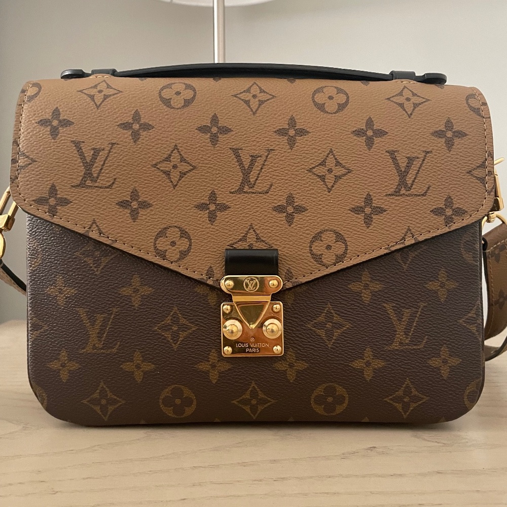 Authentic Louis Vuitton reverse Pochette Métis